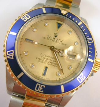 1990s bicolour Submariner model 16613 with <b>champagne / sapphire and diamond d