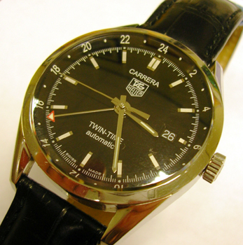 Gent's <b>TAG Heuer Carrera Twin-Time</b> automatic strap watch, black dial and