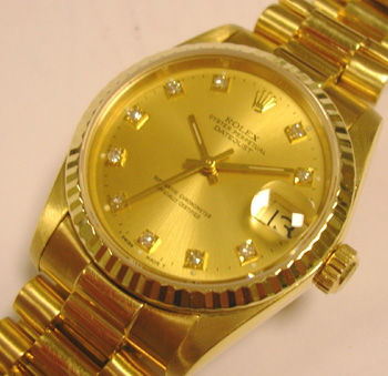 18ct mid-size Rolex Datejust, original champagne / diamond dial. Price reflects