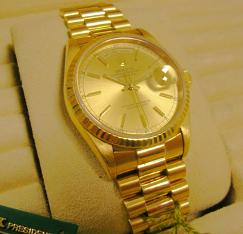 1999 gent's 18ct Day-Date with boxes and papers, President bracelet. <b>NEW equi