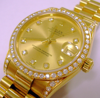 18ct yellow gold mid-size model 78238 sold new in the UK in 2003 with <b>genuine