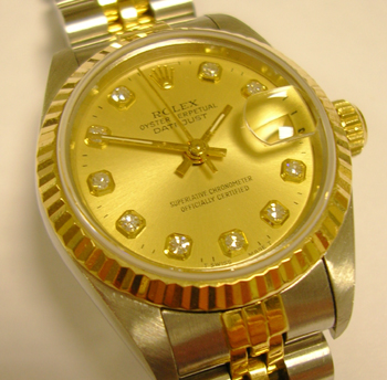 Bicolour Datejust with custom-made champagne / diamond dot redial. Had £180 serv