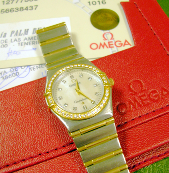Lady's bicolour mid-size <b>Omega Constellation</b> with original diamond bezel
