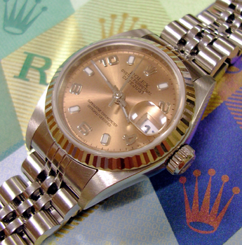 2004 steel & white metal Datejust model 79174 with salmon-pink dial and Jubilee