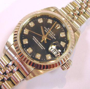 Steel and white metal Datejust model 79174 with striking <b>black / diamond dot 