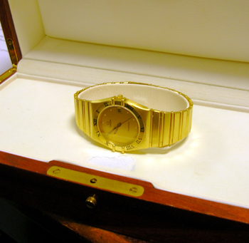 18ct gold <b>Omega</b> Constellation quartz bracelet watch, in original large wo