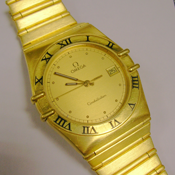 18ct gold <b>Omega</b> Constellation quartz bracelet watch, in original large wo