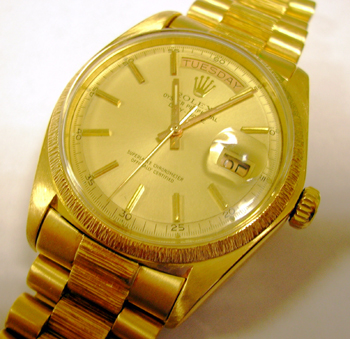 c1978 gent's 18ct Day-Date with bark-effect finish, fully serviced July 2006. 