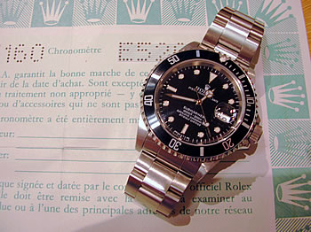 1990s steel Date Submariner, box & blank papers