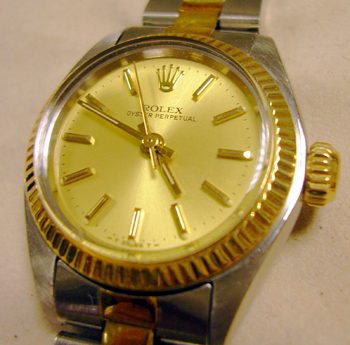 Bicolour Oyster Perpetual ( non-date ), boxed. This is an older model with plast