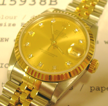 Bicolour mid-size Datejust with champagne / diamond dial, Jubilee bracelet