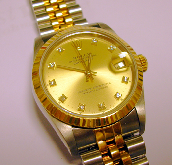 Bicolour Datejust with champagne / DIAMOND dot dial and Jubilee bracelet. NEW eq