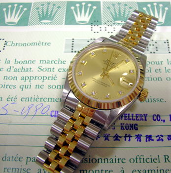 Bicolour mid-size Datejust with champagne / DIAMOND dial and original Rolex pape