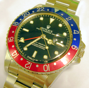 Collectible plastic glass GMT-Master model 16750 with red / blue bezel and Oyste