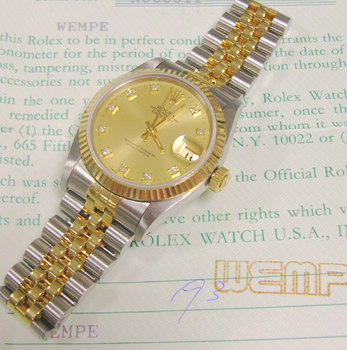 Bicolour mid-size Datejust with champagne / diamond dial and original papers fro