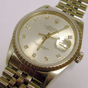 All stainless steel model 16220 Datejust with silver / diamond dot dial and Jubi