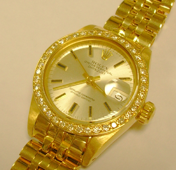 Early 1980s yellow gold Lady-Date with a custom-made diamond bezel fitted later.