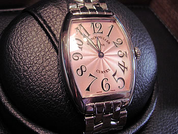Midsize <b>Franck Muller</b> quartz in stainless steel with pink dial. Immaculat