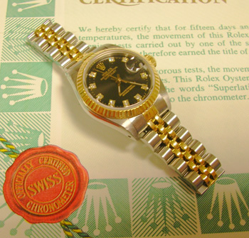 Stunning lady's bicolour Datejust with diamond dot black dial and original USA p
