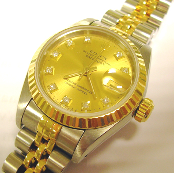 Classic lady's Datejust with champagne / diamond dot dial. Save over £1,700 off 