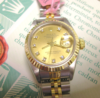 Beautiful bicolour Datejust with champagne / diamond dot dial and original paper