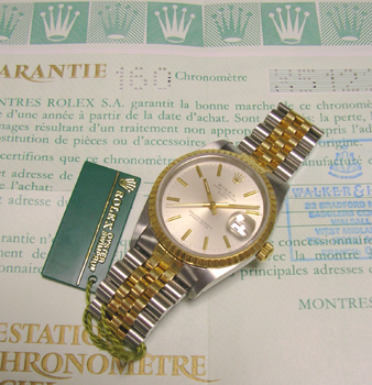 Magnificent bicolour DATE with original boxes, blank papers and manual. Over £1,