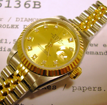 Bicolour Datejust model 69173 with <b>champagne / diamond dot dial</b> on Jubile