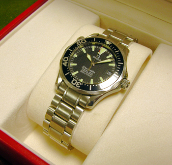 Mid-size steel <b>Omega</b> Seamaster automatic bracelet watch with boxes, cards
