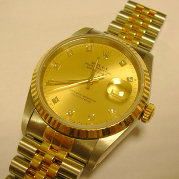 Bicolour Datejust with champagne / diamond dial and Jubilee bracelet.