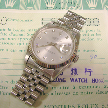 Steel / white metal Datejust with silver / DIAMOND DIAL and original papers. The