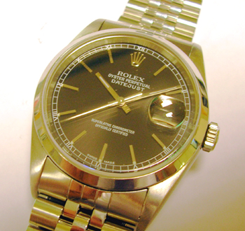 Steel Datejust with black dial, Jubilee bracelet. Was serviced by Rolex UK in 20