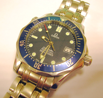 Stainless steel mid-size <b>Omega</b> Seamaster quartz, blue trim.