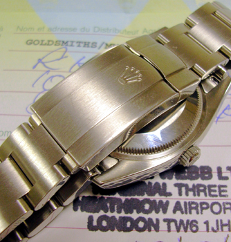 Stainless steel Air-King model 114200 with salmon pink / 3-6-9 dial and Oyster 7