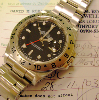 Stainless steel Explorer II model 16570 T with black dial on Oysterlock bracelet